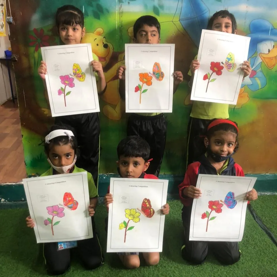 Children engaged in various educational activities at Tiny Tots Preschool, emphasizing holistic early childhood education.